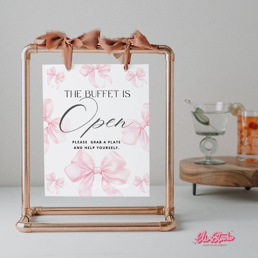 Editable pink bow signs for baby shower or birthday. Customize in Canva and print instantly. Perfect feminine printable party decor.