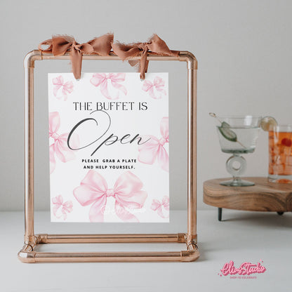 Editable pink bow signs for baby shower or birthday. Customize in Canva and print instantly. Perfect feminine printable party decor.